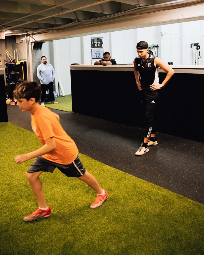 Athlete working on close ball control at Prestige Indoor Sports indoor soccer training